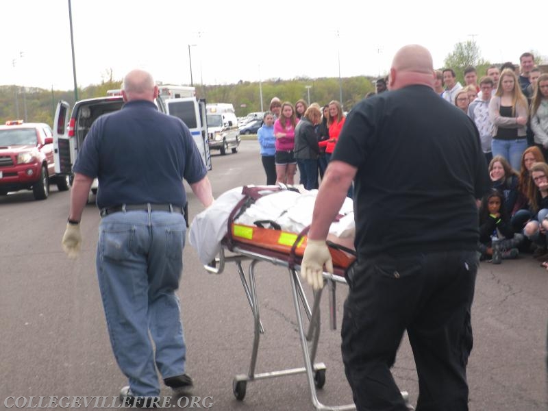 Corners office removing deceased accident victims.