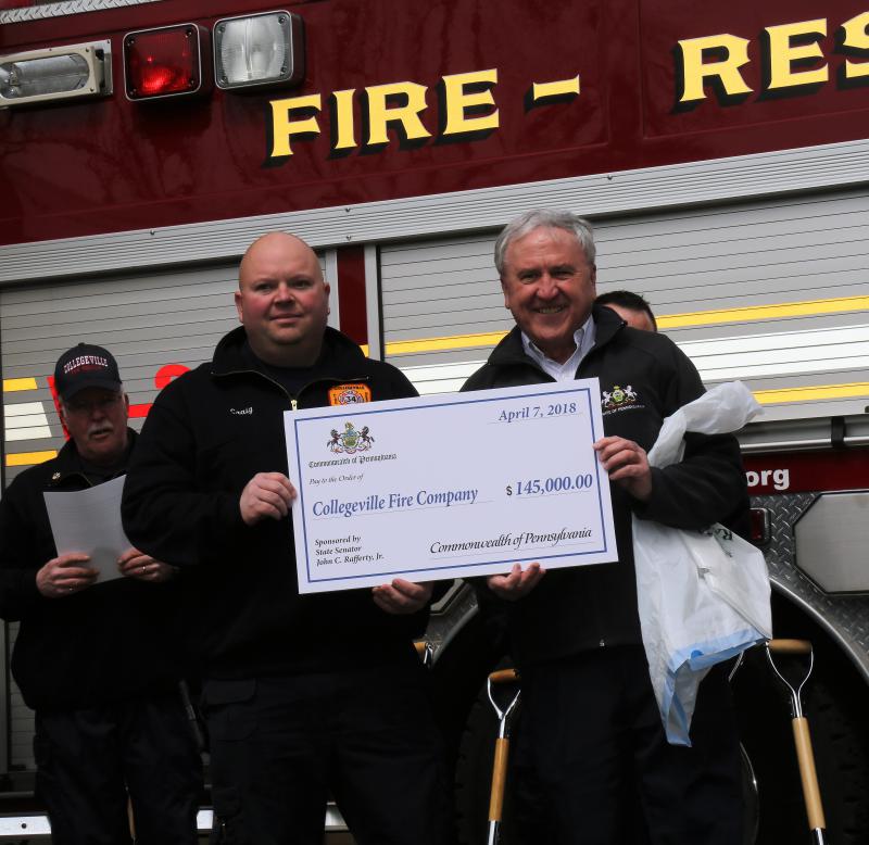 Senator Rafferty presents Fire Company with a check for $145,000.00
