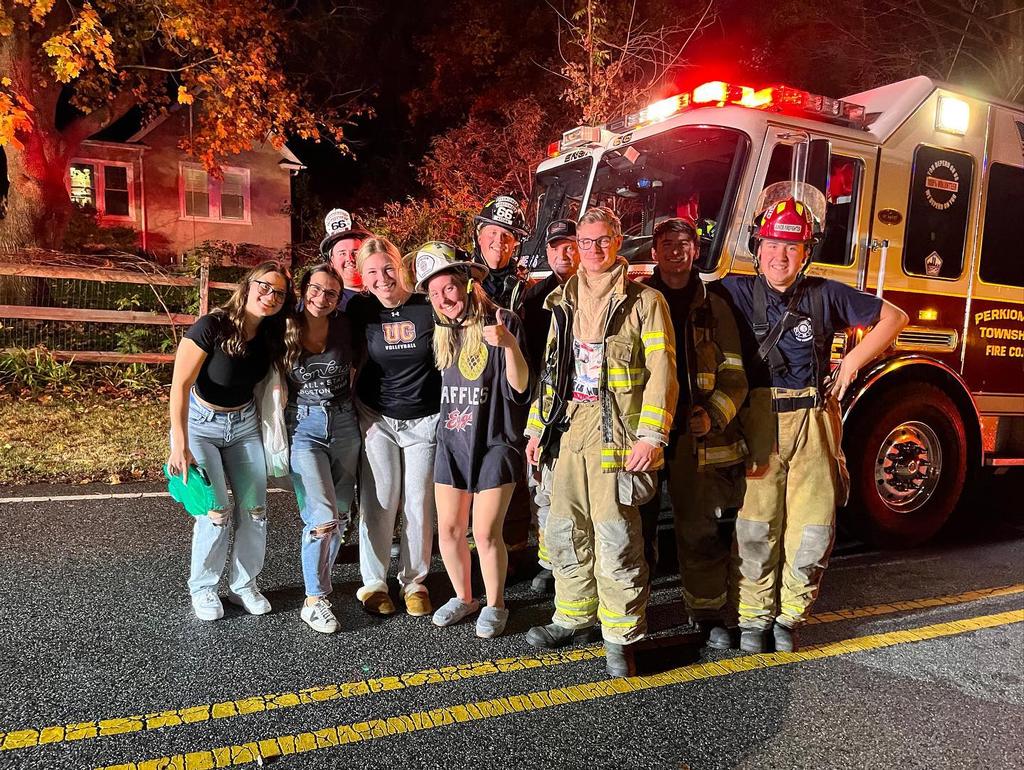 A few of the students from the dorm, meet the Firefighters