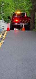 Utility 34 doing advanced warning for residence past the closure point just before the tree down.